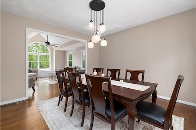 Formal dining room with hardwood floors