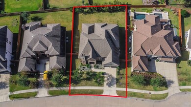 Amazing aerial shot of this gorgeous Toll Brothers home situated on a spacious lot in the sought after community of The Reserve at Katy and zoned to Katy ISD.