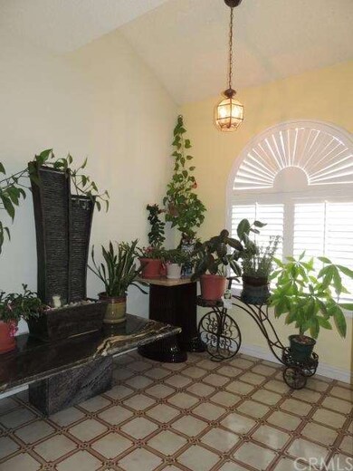 Entryway with vaulted ceiling