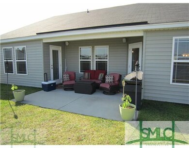 Exterior Back. Oversized Covered Patio Area with O