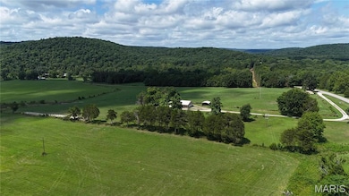 Mountain view with a heavily wooded area and rural landscape