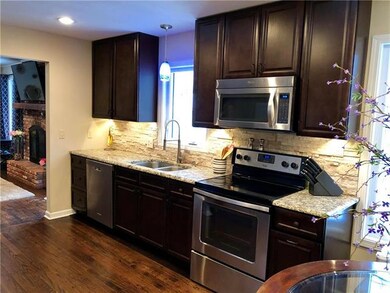 Stainless Steel appliances and cabinets with soft 
