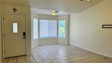 Entrance foyer with tile and lots of natural light