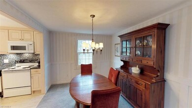 Distinguished millwork characterizes the crown and