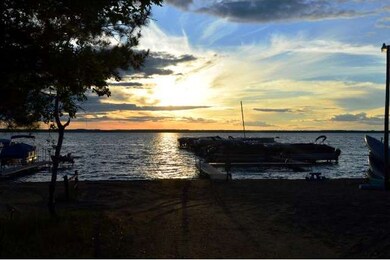 Sand beach, boat slip and sunsets!