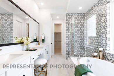 Full bath with recessed lighting, double vanity, 