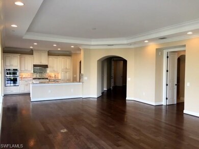 Great room looking into kitchen.
