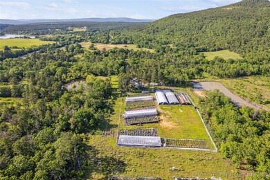 Bird's eye view of a heavily wooded area and mountains