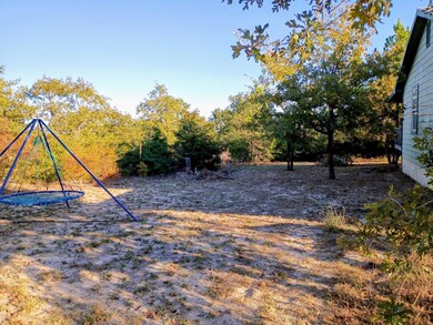 View of yard with a trampoline
