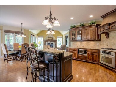 Inviting open kitchen, breakfast area and hearth r