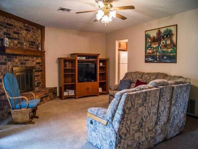Living Room. Spacious living area includes ceiling