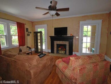Living Room. 2 french doors in living room lead to porch