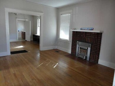 Living Room/Den with Gleaming Hardwood Floors