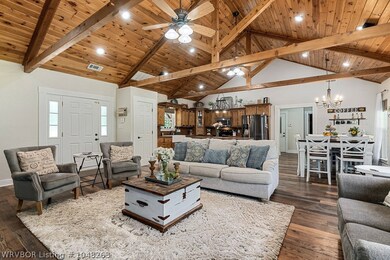 Open Floorplan with wooden beams to bring it all together