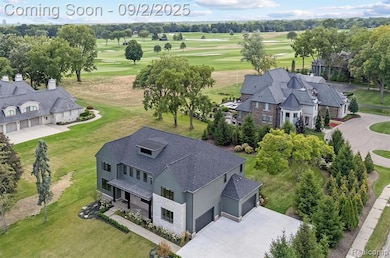 View from above of property with a local golf course