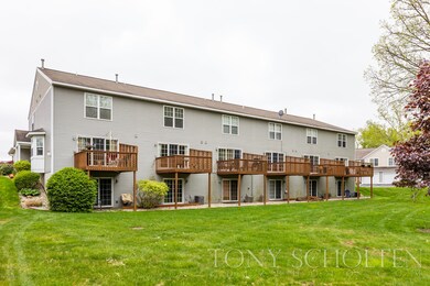 788 Stevenspoint SE unit 13, Byron Center, MI 49315 - photo 2