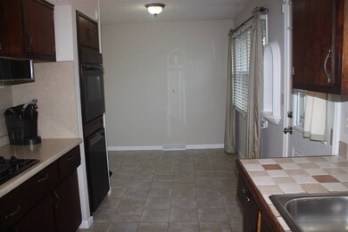 Kitchen also includes another eating space!