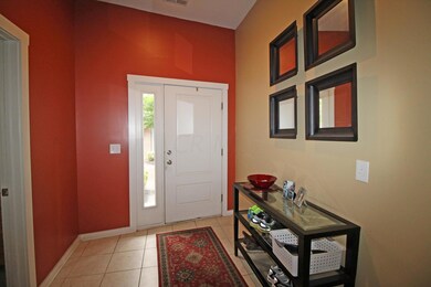 Foyer with ceramic tile floor