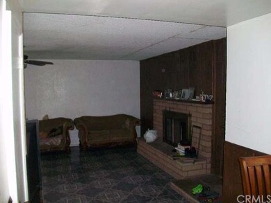 Large Family room with a fireplace.