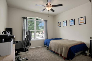 Auxiliary bedroom is complete with spacious closet