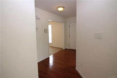 Hardwood flooring in the entry foyer.
