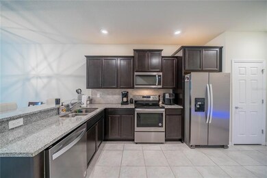 5171 Sylvester Loop, Tampa, FL 33610 - photo 7