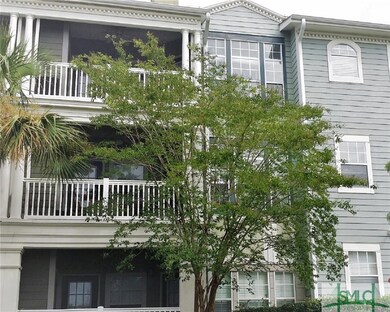 VIEW OF UPPER CONDO PORCH AND LIVING ROOM WINDOW