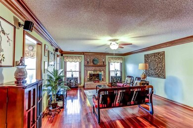 This Family Room has hardwood floors, a beautiful 