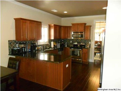 kitchen view 2, granite counter tops and the pantr