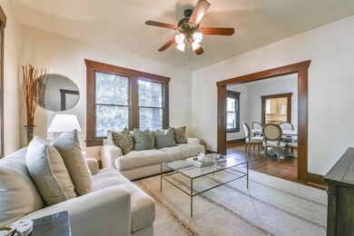 As you enter the formal living room, you will be g