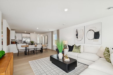 (*Photo of actual model home) The open-plan layout is perfect for hosting