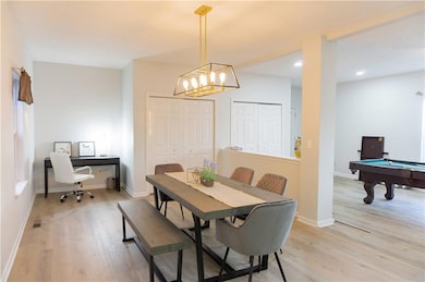 Dining space with recessed lighting, pool table, b