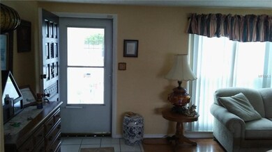 Front entry with tile traffic pattern into kitchen