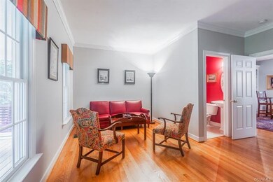 Beautiful natural light fills the living room or guest suite with a full bathroom. This room can be completely closed off from the rest of the house for a private suite or office.