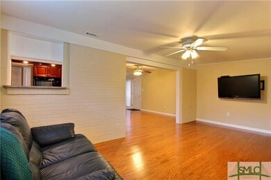 Den w/ view of foyer
