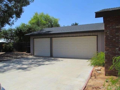 3 Car garage with roll up doors and automatic open