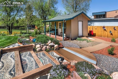 View of yard with an outdoor structure