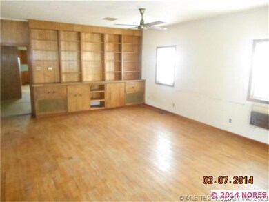 Living area.  Space features hardwoods and wonderf