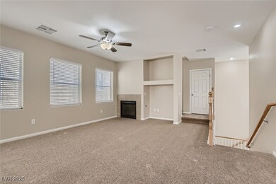 Unfurnished living room with a ceiling fan, carpet