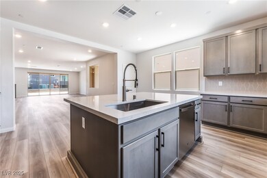 Kitchen featuring stainless steel dishwasher, ligh