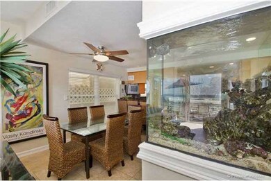 An aquarium enhances the dining area, which is ope