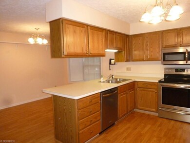 Large kitchen with breakfast bar and separate dine