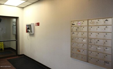 Entrance to building and mailboxes
