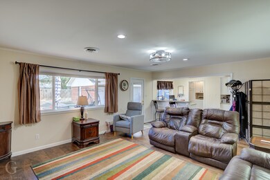 Beautiful wood flooring. Large window for tons of natural light. Overlooks the privacy fenced back yard