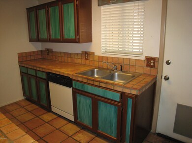 Kitchen w/ Door to Patio
