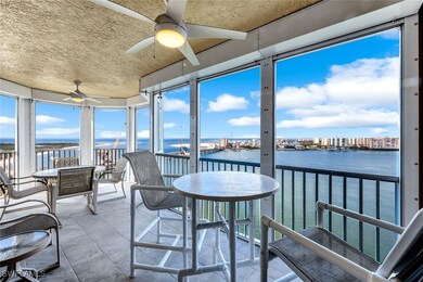Sunroom / solarium featuring a water view and ceil