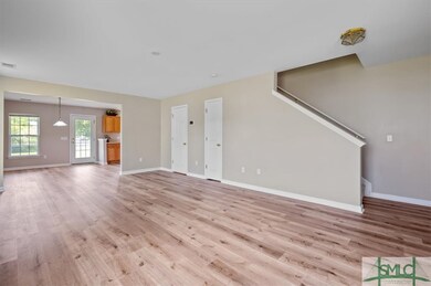 Spacious great room with New Luxury Vinyl Plank fl