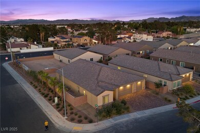 Aerial view at dusk of a mountain view and a resid