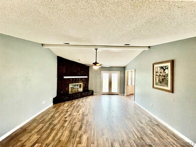Welcome living area with French Door to Backyard P