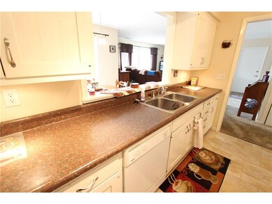 Kitchen, convenient pass through to dining area.
